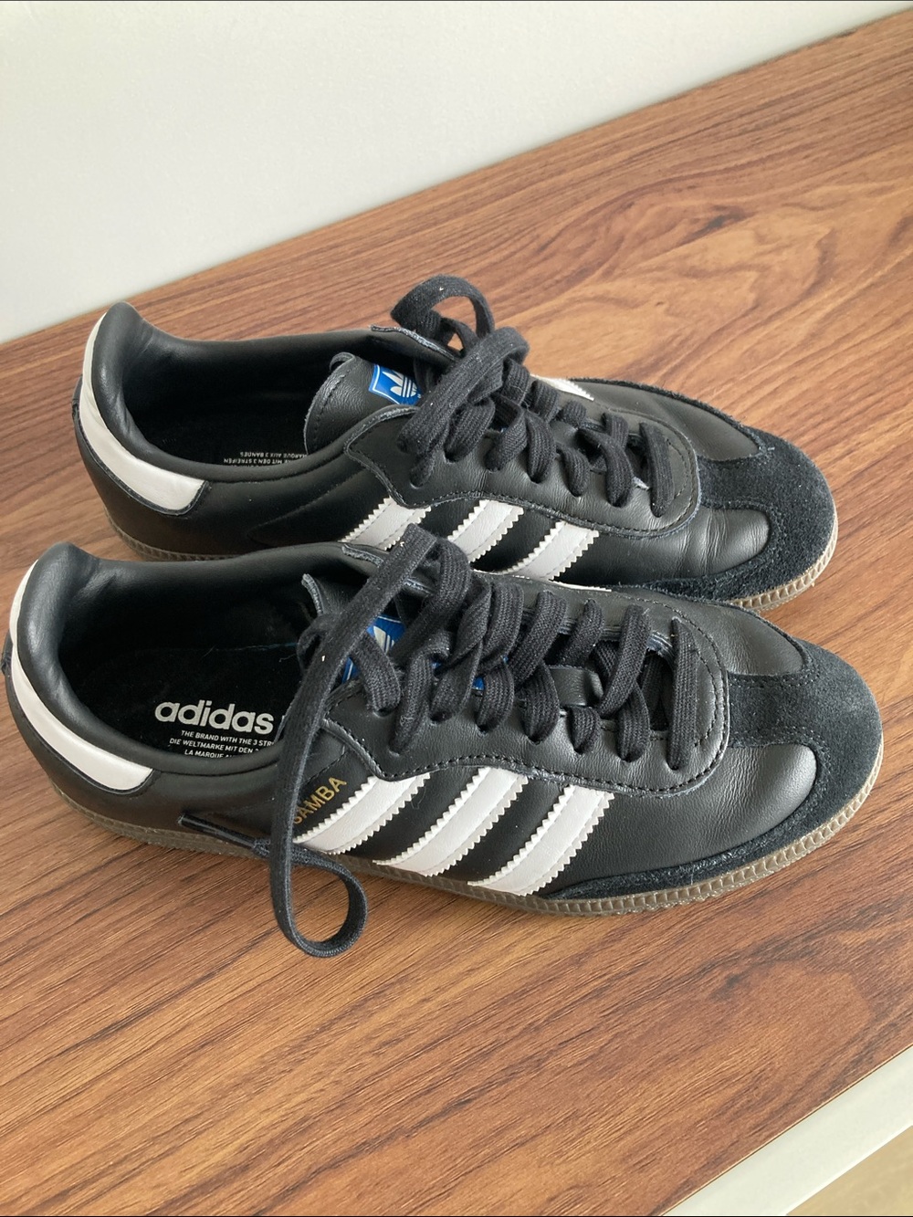 adidas Black Casual Sneakers with White Logo and Blue Accent
